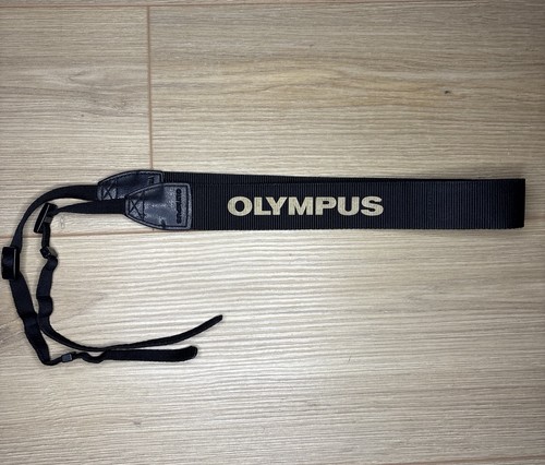 Olympus black camera - camera, neck