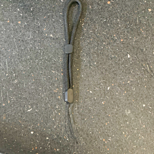 Black wrist strap lanyard - wrist,